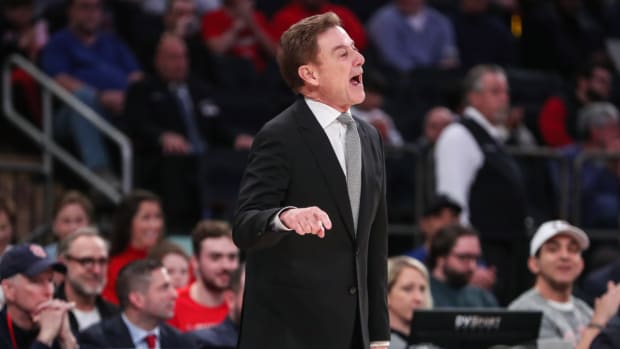  St. John's Red Storm head coach Rick Pitino yells out instructions in the first half against the Georgetown Hoyas at Madison Square Garden.